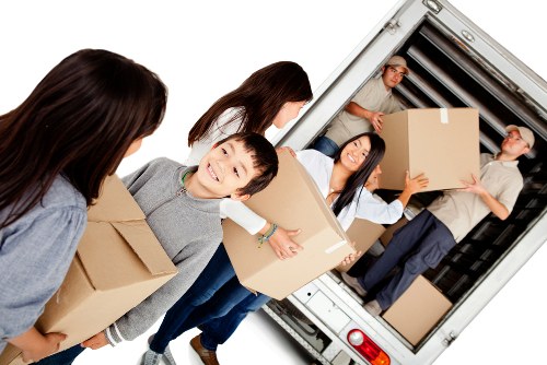Van moving team preparing items safely with protective equipment