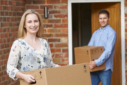 Local office movers transporting equipment for a business move in Hackney Marshes