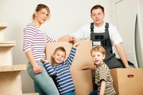 Furniture and boxes being loaded into a removal van in East London