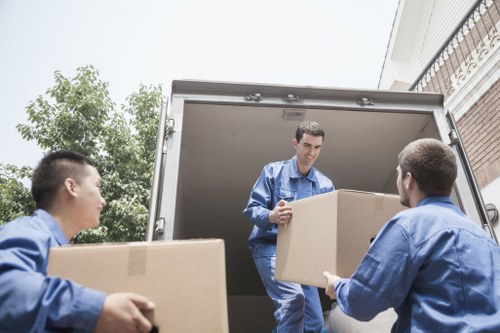Packed boxes and furniture ready for a local house move