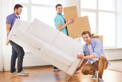 Worker assessing a removal task and checking handling risks