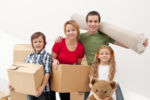 Removal team loading furniture for a move in East London