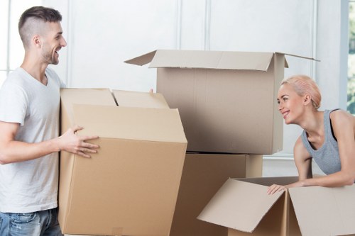 Professional movers loading a van for a Hackney Marshes relocation